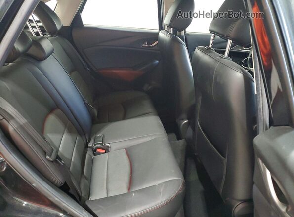 JM1DKFC71H0146295 2017 MAZDA CX-3 Black Հետևի նստատեղերի տեսք