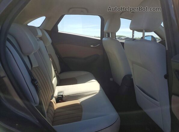 JM1DKFC74M1501898 2021 MAZDA CX-3 Charcoal Вид задньої частини салону