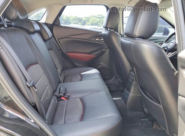 JM1DKFC78H0144737 2017 MAZDA CX-3 Black Հետևի նստատեղերի տեսք