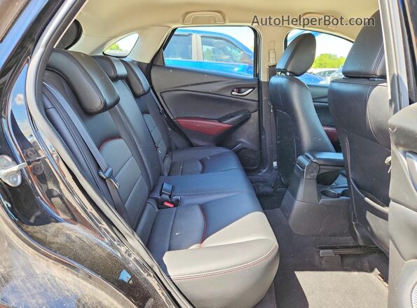 JM1DKFC79H0144424 2017 MAZDA CX-3 Black Widok wnętrza z tyłu