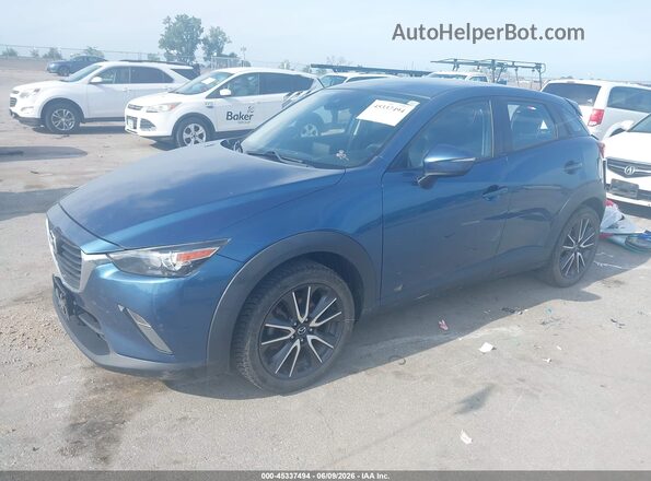 JM1DKFC7XJ0316188 2018 MAZDA CX-3 Blue Vista tres cuartos delantera izquierda