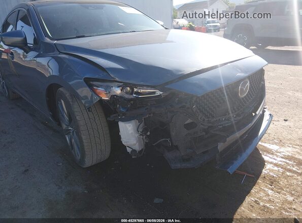 JM1GL1VM9J1329895 2018 MAZDA 6 Blue Вид спереду