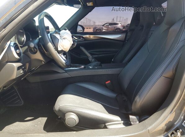 JM1NDAM72R0607988 2024 MAZDA MX-5 Charcoal Front interior view