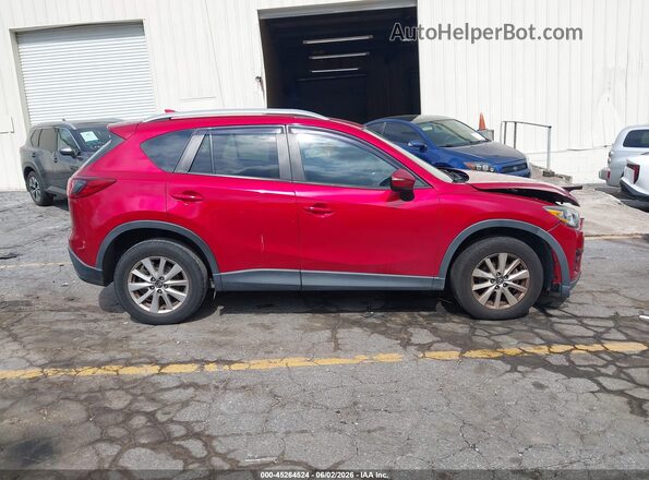 JM3KE2CY0G0732587 2016 MAZDA CX-5 Red Rear interior view