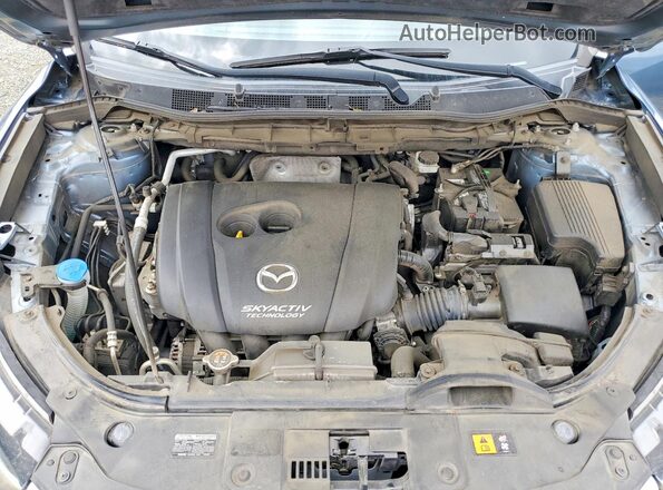 JM3KE2CY2G0792967 2016 MAZDA CX-5 Teal Սալոնի հետևի տեսք