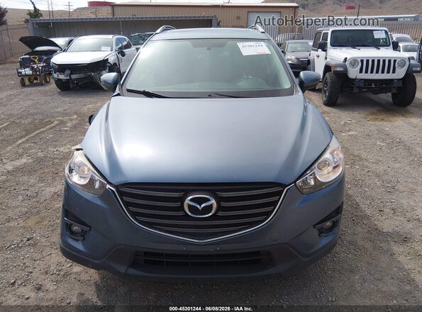 JM3KE2CY2G0892079 2016 MAZDA CX-5 Blue Սարքավորումների վահանակի տեսք