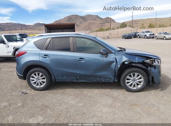 JM3KE2CY2G0892079 2016 MAZDA CX-5 Blue Սալոնի հետևի տեսք