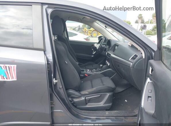 JM3KE2CY4G0712570 2016 MAZDA CX-5 Gray Vista interior delantera