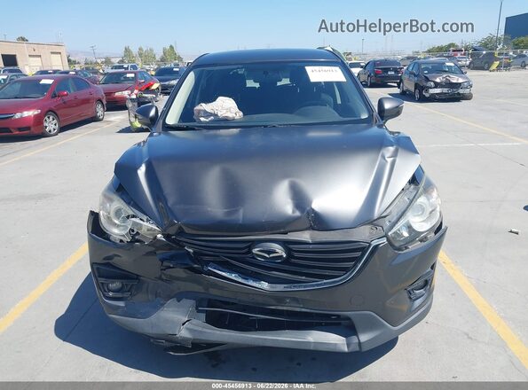 JM3KE2CY4G0712570 2016 MAZDA CX-5 Gray Vista del cuadro de instrumentos