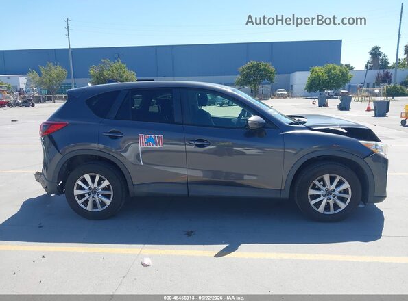 JM3KE2CY4G0712570 2016 MAZDA CX-5 Gray Vista interior trasera