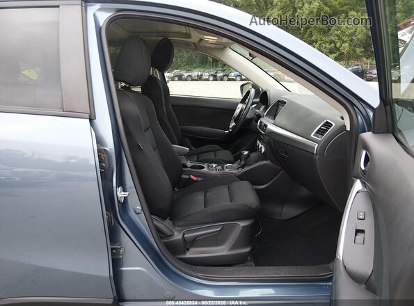 JM3KE2CY6G0826991 2016 MAZDA CX-5 Blue Vista interior delantera