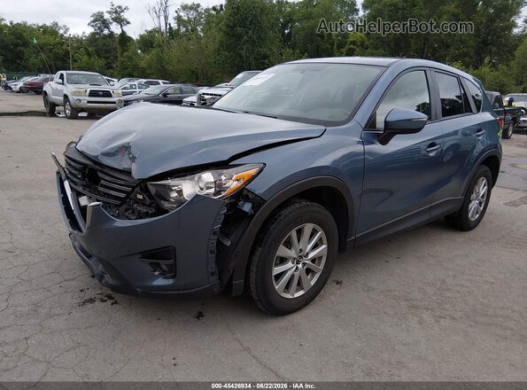 JM3KE2CY6G0826991 2016 MAZDA CX-5 Blue Vista tres cuartos delantera izquierda
