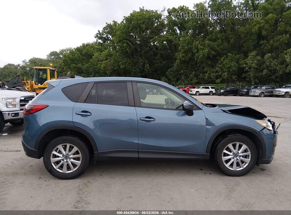 JM3KE2CY6G0826991 2016 MAZDA CX-5 Blue Vista interior trasera