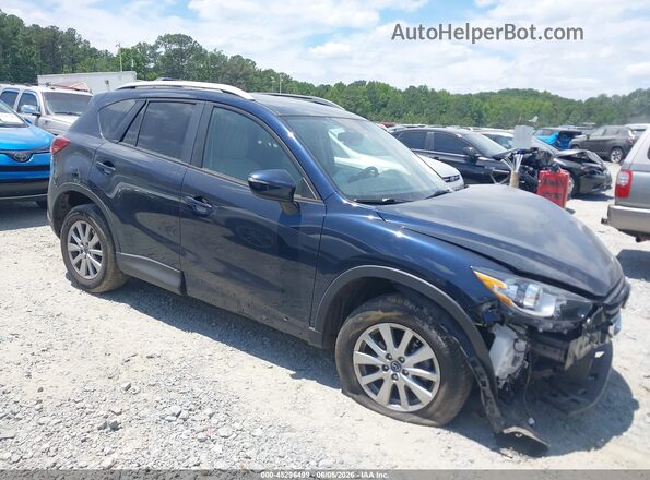 JM3KE2CY7G0915212 2016 MAZDA CX-5 Gray Вид задньої частини салону