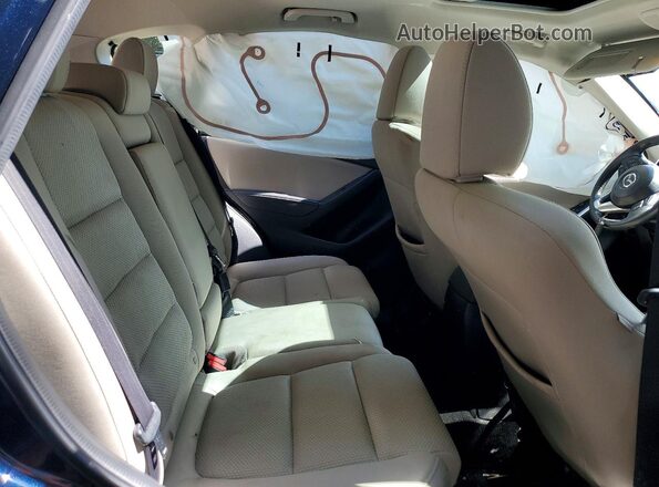 JM3KE2CY9G0780282 2016 MAZDA CX-5 Blue Rear interior view