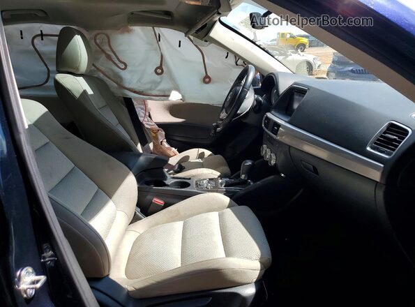 JM3KE2CY9G0780282 2016 MAZDA CX-5 Blue Front interior view