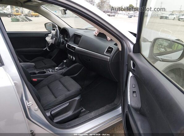 JM3KE2CY9G0873206 2016 MAZDA CX-5 Silver Вид салону спереду