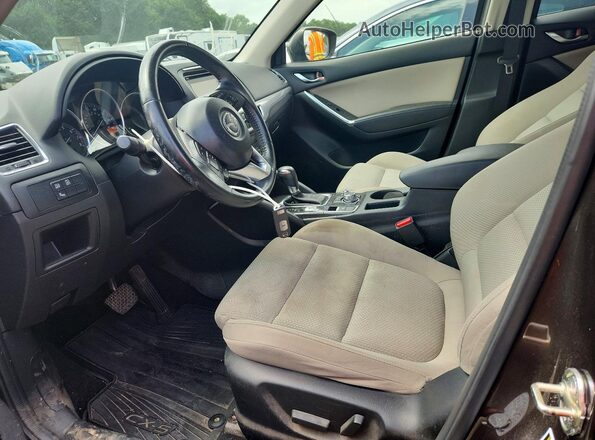 JM3KE2CYXG0886479 2016 MAZDA CX-5 Brown Widok wnętrza z przodu