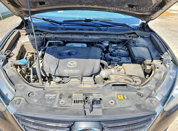 JM3KE2CYXG0886479 2016 MAZDA CX-5 Brown Widok wnętrza z tyłu