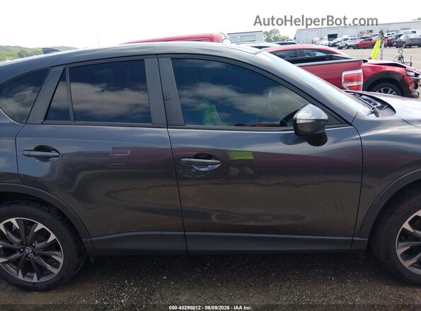 JM3KE2DY0G0854736 2016 MAZDA CX-5 Gray უკანა სალონის ხედი