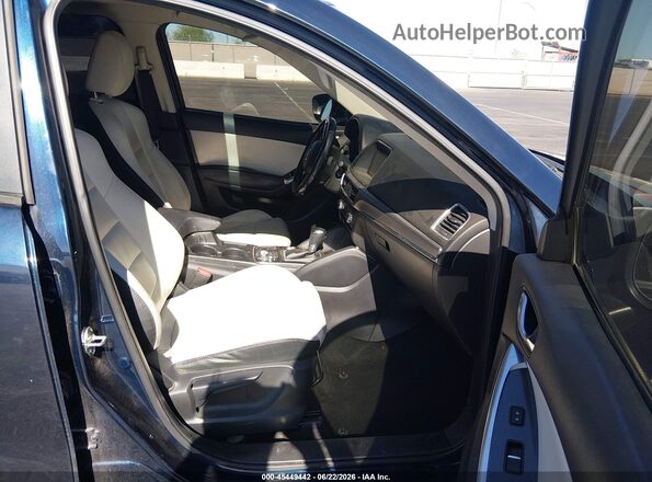 JM3KE2DY1G0908027 2016 MAZDA CX-5 Blue Front interior view