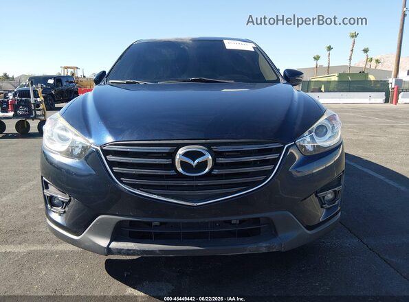 JM3KE2DY1G0908027 2016 MAZDA CX-5 Blue Dashboard view
