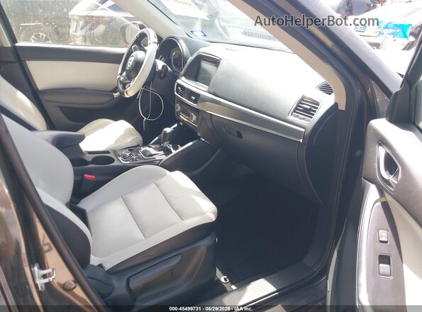 JM3KE2DY3G0703020 2016 MAZDA CX-5 Black Front interior view