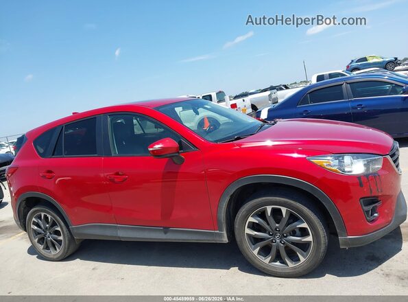 JM3KE2DY7G0745836 2016 MAZDA CX-5 Red Vista interior trasera