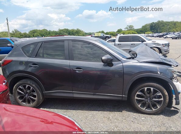 JM3KE2DY8G0712988 2016 MAZDA CX-5 Gray 360 interior view