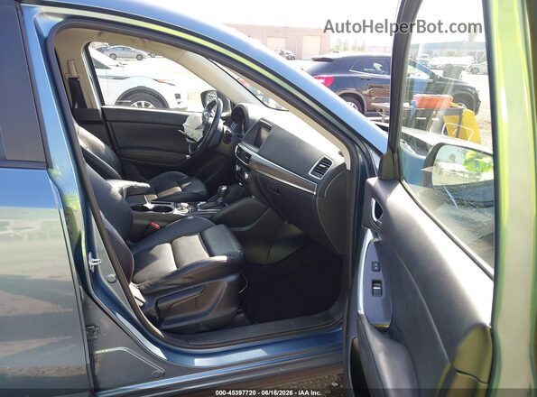 JM3KE2DY9G0856498 2016 MAZDA CX-5 Light Blue Vista interior delantera