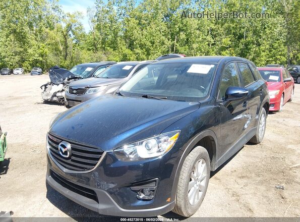 JM3KE4CY1G0908557 2016 MAZDA CX-5 Navy Առջևի ձախ երեք քառորդ տեսարան