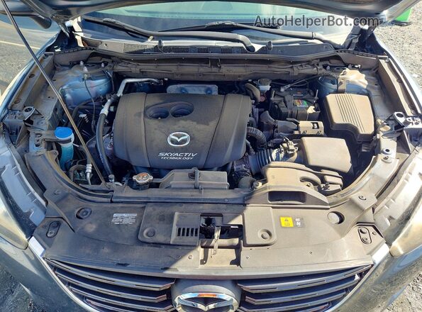 JM3KE4CY2G0667446 2016 MAZDA CX-5 Blue Widok wnętrza z tyłu
