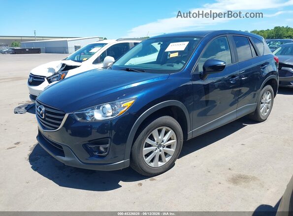 JM3KE4CYXG0908413 2016 MAZDA CX-5 Dark Blue Vista tres cuartos delantera izquierda