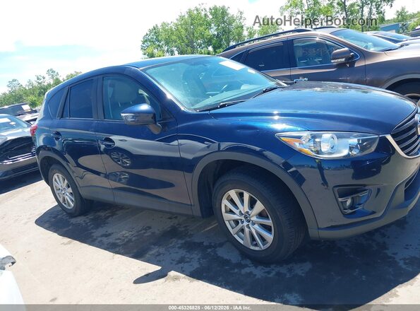 JM3KE4CYXG0908413 2016 MAZDA CX-5 Dark Blue Vista interior trasera