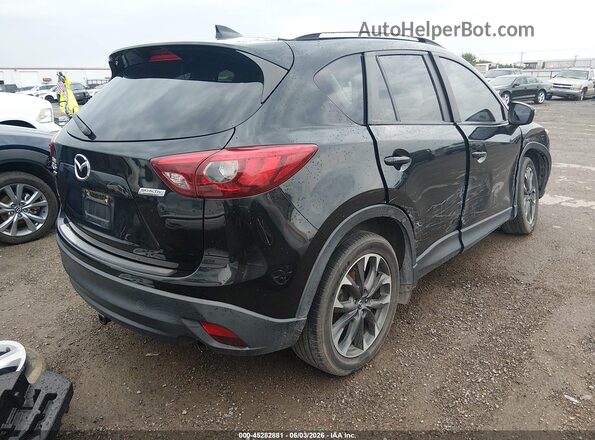 JM3KE4DY0G0639319 2016 MAZDA CX-5 Black Rear right