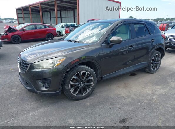JM3KE4DY2G0686643 2016 MAZDA CX-5 Black Առջևի ձախ երեք քառորդ տեսարան
