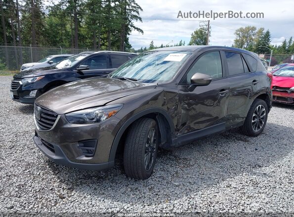 JM3KE4DY3G0674548 2016 MAZDA CX-5 Gray Առջևի ձախ երեք քառորդ տեսարան