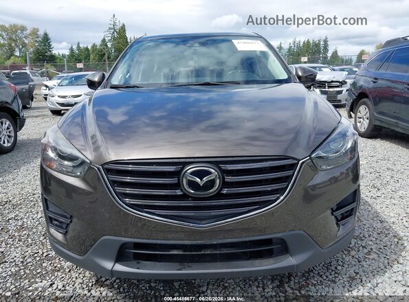 JM3KE4DY3G0674548 2016 MAZDA CX-5 Gray Սալոնի հետևի տեսք