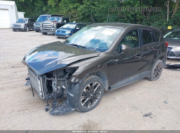 JM3KE4DY4G0809438 2016 MAZDA CX-5 Gray Vista tres cuartos delantera izquierda