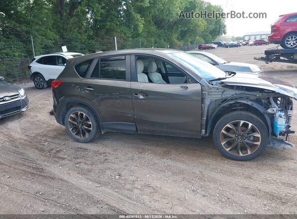 JM3KE4DY4G0809438 2016 MAZDA CX-5 Gray Vista interior trasera