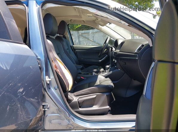 JM3KE4DY6G0777253 2016 MAZDA CX-5 Blue წინა სალონის ხედი