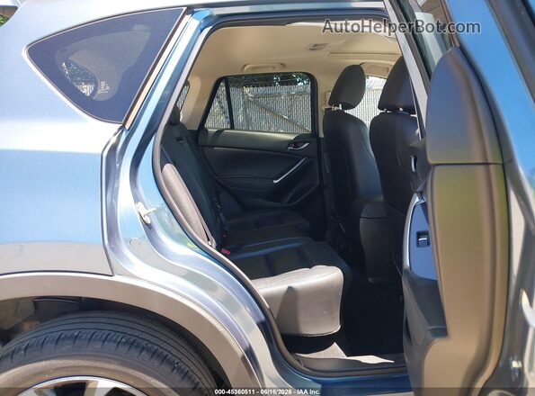 JM3KE4DY6G0777253 2016 MAZDA CX-5 Blue VIN კოდის სტიკერის ხედი