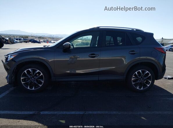 JM3KE4DY6G0870287 2016 MAZDA CX-5 Gray Rear interior view