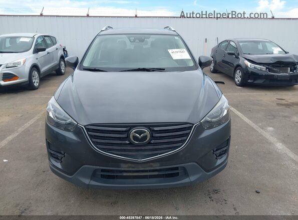 JM3KE4DY6G0877062 2016 MAZDA CX-5 Gray Սալոնի հետևի տեսք