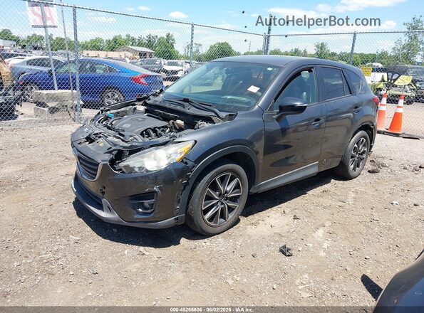 JM3KE4DY9G0795651 2016 MAZDA CX-5 Серый Передняя левая четверть