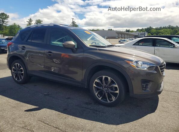 JM3KE4DYXG0752274 2016 MAZDA CX-5 Коричневый Передняя правая четверть