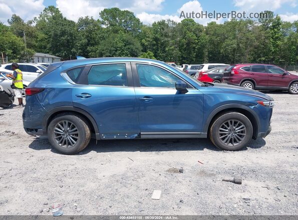 JM3KFABM1K1509435 2019 MAZDA CX-5 Blue Rear interior view