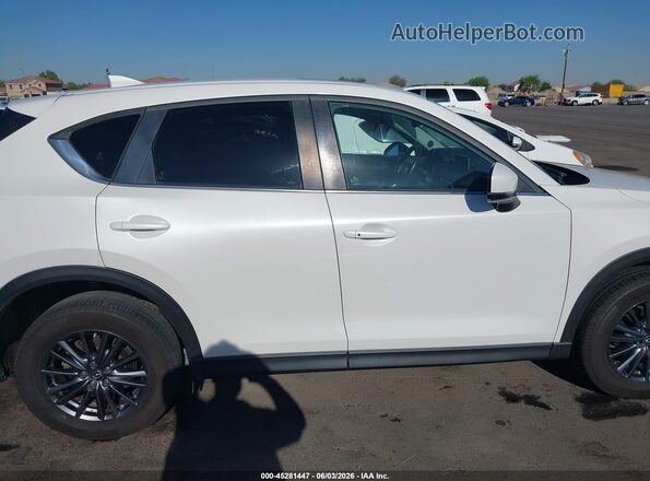 JM3KFACM0K0698650 2019 MAZDA CX-5 White Vista interior trasera