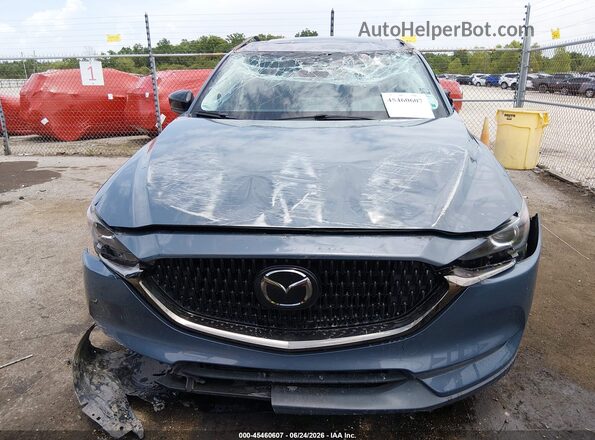 JM3KFACY7M0369448 2021 MAZDA CX-5 Blue Вид задньої частини салону