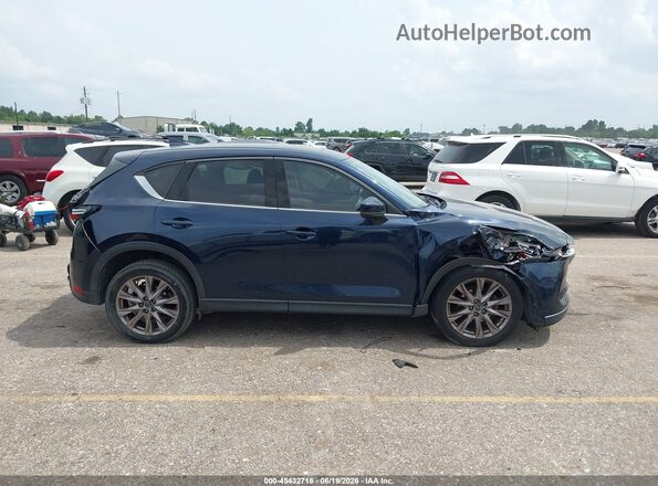 JM3KFADM0K1556825 2019 MAZDA CX-5 Blue Rear interior view